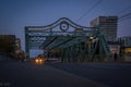 Old steel road bridge in evening time, night lights. Don valley, Toronto, Ontario