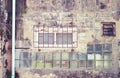 Old steel and wooden windows on dirty vintage retro style wall w