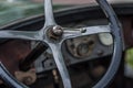 Old steering wheel in classic car
