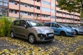 Old blue French car Citroen Xsara Picasso and C3 minivan parked