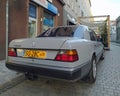 Classic elegant old grey sedan car Mercedes Benz 250 D right side rear part view parked
