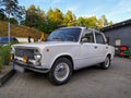 Classic old Soviet white sedan car Lada 124 front part and left side view parked Royalty Free Stock Photo