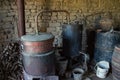 Old still with wood heater for making fruit alcohol in a craft distillery