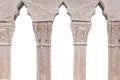 Old stone balusters on a white background