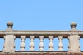 Old stone balustrade with blue sky