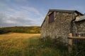 Old stone barn loft in field