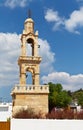Old stone Bell tower at Church of the Assumption of the Virgin Mary in Greek Asklipio village on Rhodes Royalty Free Stock Photo