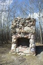 Old Stone and Brick Fireplace Remains in the Woods From an Old Ranch House Royalty Free Stock Photo