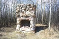 Old Stone and Brick Fireplace Remains in the Woods From an Old Ranch House Royalty Free Stock Photo