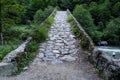 Old cobblestone arch bridge