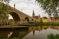 old stone bridge and downtown Regensburg Royalty Free Stock Photo