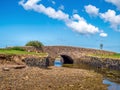 Old stone bridge at the entrance to Northam Burrows country park, Devon, UK. Royalty Free Stock Photo