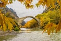 Old stone bridge in Konitsa and Aoos River an autumn day,Epirus, Western Greece Royalty Free Stock Photo