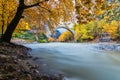 Old stone bridge in Konitsa and Aoos River an autumn day,Epirus, Western Greece. (Soft Focus) Long exposure using ND filter Royalty Free Stock Photo