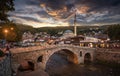 Old stone bridge and old Ottoman Sinan Pasha Mosque in Prizren, Kosovo