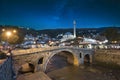 Old stone bridge and old Ottoman Sinan Pasha Mosque in Prizren, Kosovo