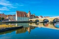 Old stone bridge over river Danube in Regensburg, Germany Royalty Free Stock Photo