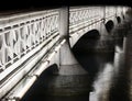 Old stone bridge over the river in Zurich at night