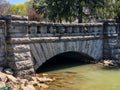 Old stone bridge in park in Oshkosh, Wisconsin