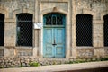 Old stone building with a blue wooden door in Karabagh Royalty Free Stock Photo