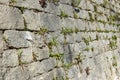 Old stone castle wall made of stone brick slabs. Royalty Free Stock Photo