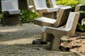 Old stone chair in the park. Royalty Free Stock Photo