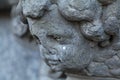 Old stone cherub head from side in Umea city Royalty Free Stock Photo