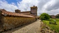 Old stone church in cloudy day and wide angle photo