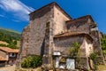 Old stone Church of San Roque on sunny day. Carmona, Cantabria, Spain