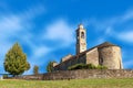 Old stone church under blue sky. Royalty Free Stock Photo