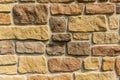 Old stone cladding plates on the wall closeup. Royalty Free Stock Photo