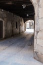 Old stone corridor building on an old town district in Girona, Catalonia