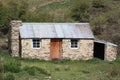 An old stone cottage in New Zealand. Royalty Free Stock Photo