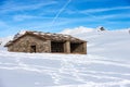 Old stone Cow Shed on Lessinia High Plateau in Winter with Snow - Veneto Italy Royalty Free Stock Photo