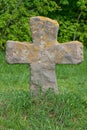 Old Stone Cross In Grass