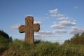 Old stone cross with sword symbol Royalty Free Stock Photo