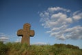 Old stone cross with sword symbol Royalty Free Stock Photo