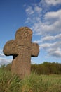 Old stone cross with sword symbol Royalty Free Stock Photo