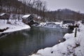 Old 1850 stone dam and mill hyde wisconsin near Ridgeway in winter after fresh snow Royalty Free Stock Photo