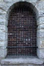 Old stone entrance with steel bars