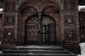 Old stone entrance to the church. Brick wall. Royalty Free Stock Photo