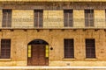 Old stone facade faced historic building in Cape Town city Royalty Free Stock Photo