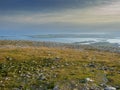 Old stone fence on a mountain in Burren National park, Ireland, Atlantic ocean in the background. Nobody Royalty Free Stock Photo