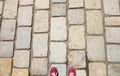 Old stone footpath and a man in red shoes Royalty Free Stock Photo