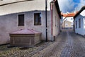 Old stone fountain on beautiful cobbled street, Tabor, Czech Republic