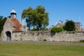 Old stone gatehouse with Tudor Clock Tower at the entrance to Beaulieu Abbey in the New Forest in the south of England