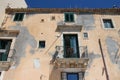 old stone habitation building in syracuse in sicily (italy)