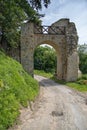 Old stone historic gate in ruin with an old stone castle in Poland in Dobczyce