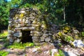Old stone house deep in the forest. Abandoned stone house in the