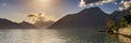 Old stone house in Kotor Bay with mountains and crystal clear water in the Balkans, Montenegro on the on Adriatic Sea Royalty Free Stock Photo